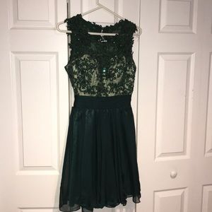 Emerald green open backed short prom dress